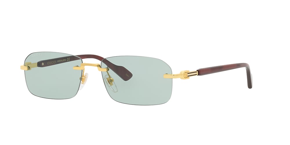 Gucci gold clearance and green sunglasses